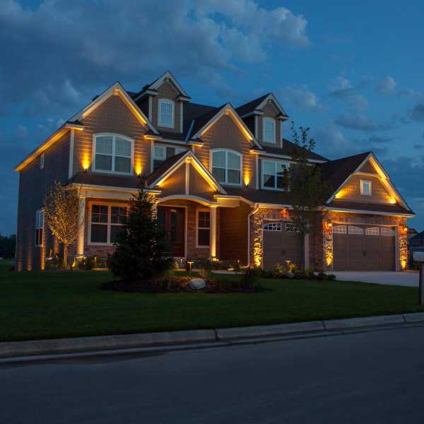 House at Night with Landscape Lighting